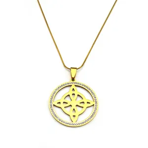 Gold plated stainless steel witch knot necklace with a sparkling rhinestone pavé circle