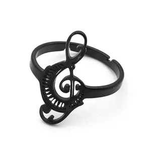 Adjustable black stainless steel ring featuring a musical G-clef treble clef symbol