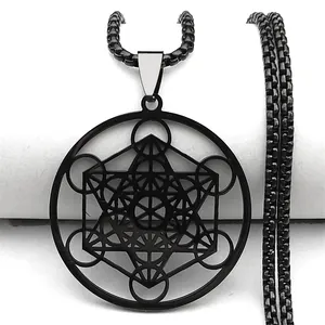 Detailed close-up of a black Metatron's Cube pendant with complex geometric hollow patterns