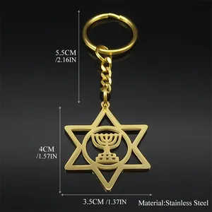 Polished gold stainless steel Star of David keychain with a Menorah center cutout detail