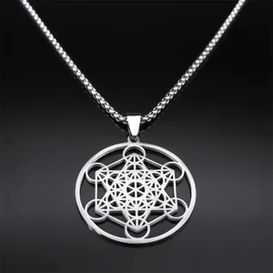 Detailed close-up of Metatron Cube pendant in silver stainless steel finish