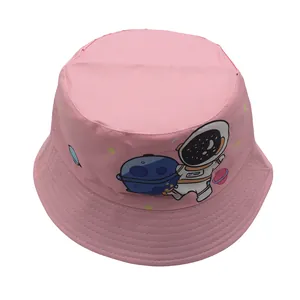 Detail of pink kids bucket hat with cute astronaut print and reinforced stitched brim