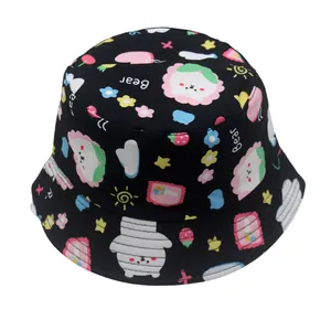Detail of kids black bucket hat featuring colorful cartoon lion, bear and star prints