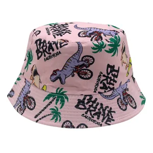 Pink cotton bucket hat for kids featuring colorful cartoon dinosaur and shark prints
