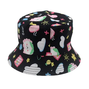 Close-up of cute cartoon bear, star, and flower print on black cotton kids bucket hat