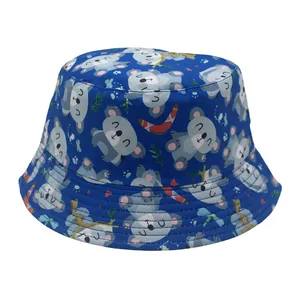 Kids reversible bucket hat with blue cartoon koala and leaf prints on cotton fabric