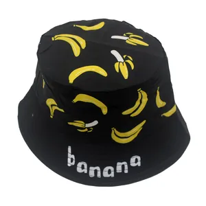 Kids black cotton bucket hat with yellow banana print and banana typography design