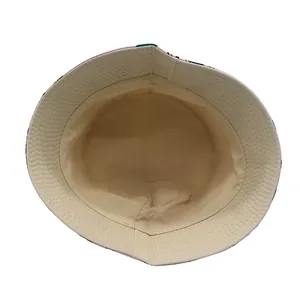 Detail view of the interior lining and clean stitching of the kids dinosaur bucket hat