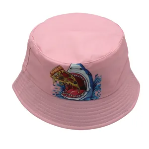 Close-up of pink cotton sun hat featuring a cartoon shark eating pizza print and stitched brim
