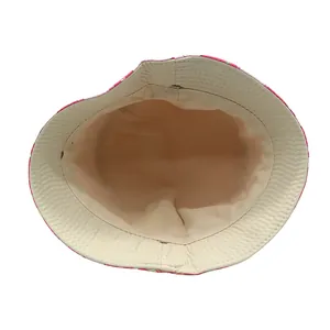 Detail of the inner lining and stitching on the pink floral cotton bucket hat