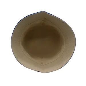 Detailed view of kids bucket hat interior with breathable beige mesh and navy brim