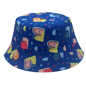 Navy blue reversible kids bucket hat featuring colorful cartoon snail prints and wide brim