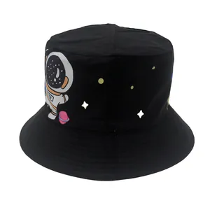 Detailed close-up of cartoon astronaut print on black kids bucket sun hat with stars
