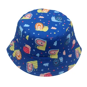 Detail of kids bucket hat with navy blue cotton fabric and cute cartoon snail patterns