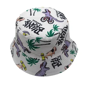 Detail view of cartoon dinosaur and shark prints on white canvas kids bucket hat