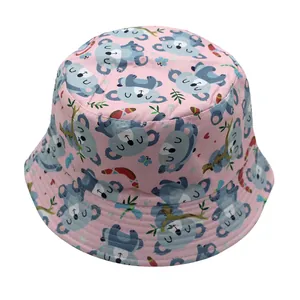 Close-up of pink bucket hat featuring cute cartoon koala print and neat stitching detail