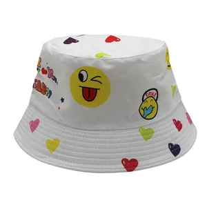 Kids reversible bucket hat with colorful smiley faces and hearts print in white cotton