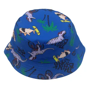 Detailed overhead view of navy blue kids bucket hat with shark and dinosaur prints