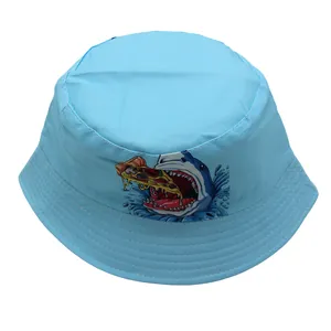 Close-up of kids light blue bucket hat featuring a funny shark eating pizza cartoon print
