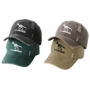 Multiple colors of vintage washed cotton dinosaur baseball caps with distressed ripped details