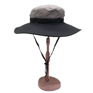 Detail of two-tone wide brim sun hat with adjustable windproof cord for fishing