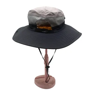 Close-up of sun hat with breathable mesh, wide brim, and adjustable drawstring detail