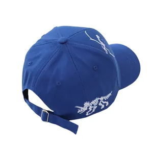 Detailed back view of children's navy baseball cap with white dinosaur embroidery and buckle