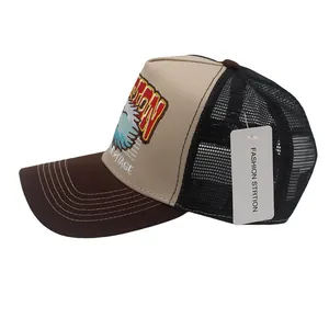 Détail de la casquette trucker vintage avec broderie aigle et filet en maille respirante