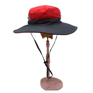 Close-up of quick-dry sun hat with mesh vents and adjustable chin strap detail