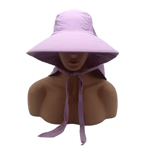 Detail view of purple sun hat featuring a wide brim and neck protection flap for hiking