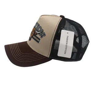 Detail der Vintage Trucker Cap mit gesticktem Stierdesign und atmungsaktivem Mesh-Gewebe