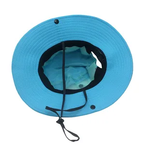 Detail of light blue outdoor sun hat with breathable mesh lining and adjustable wind cord
