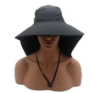 Detail of outdoor sun hat with large neck flap and adjustable chin strap on a mannequin