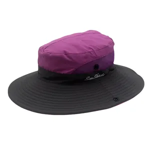 Detail of the purple mesh vents and wide brim on a breathable outdoor sun protection hat