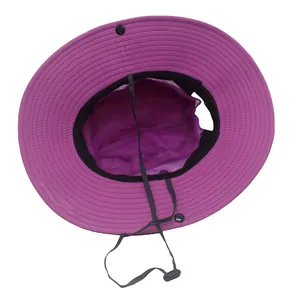Detail of purple sun hat featuring breathable mesh lining and adjustable chin strap
