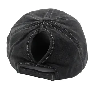 Dark grey washed cotton ponytail baseball cap with white contrast stitching and rear hole