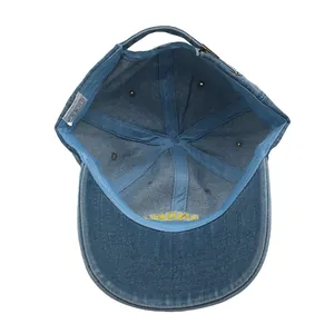 Detail of the 100% cotton inner lining and sweatband of the washed denim baseball cap
