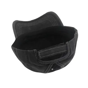 Close-up of ponytail hole and adjustable velcro strap on washed cotton baseball cap