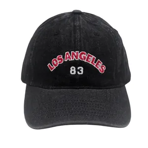 Detail of Los Angeles 83 embroidery on washed black denim baseball cap with clear stitching
