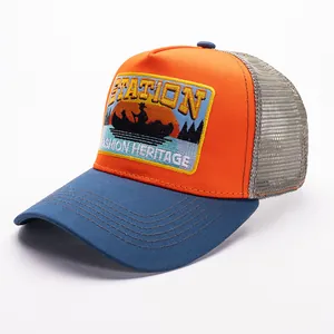 Vintage STATION embroidered trucker hat with orange panel and navy brim mesh cap