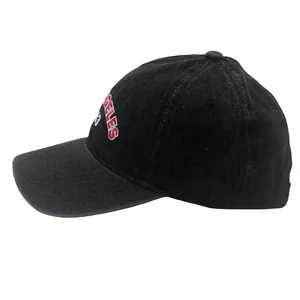 Detail of red and white Los Angeles 3D embroidery on black washed denim baseball cap
