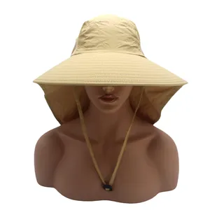 Detail of outdoor sun hat featuring wide brim, neck protective flap and adjustable chin strap