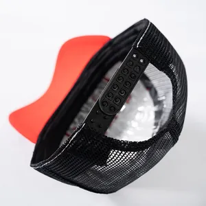 Detail of adjustable snapback closure and breathable mesh on vintage trucker hat