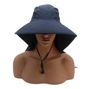 Detail of navy blue outdoor sun hat featuring wide brim and neck protection flap for hiking