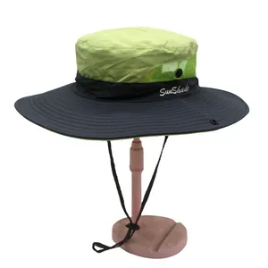 Detail of sun hat with green mesh crown, grey brim, ponytail hole and SunShade embroidery