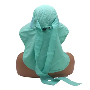 Close-up of mint green sun hat with neck flap, breathable mesh, and adjustable chin strap