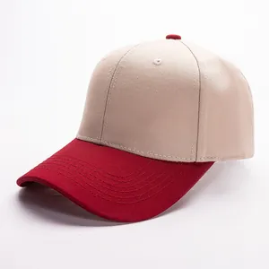 Tweekleurige katoenen honkbalpet in beige en donkerrood met premium stikselrand