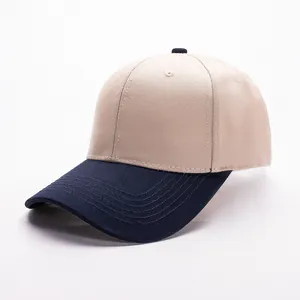 Tweekleurige katoenen honkbalpet in beige en marineblauw met een gebogen rand voor de zon