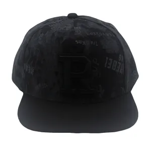 Detail of 3D embroidered R logo and graffiti pattern on black flat brim snapback hat