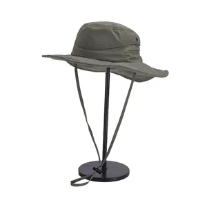 Detail view of large brim sun hat with breathable side mesh and adjustable chin strap